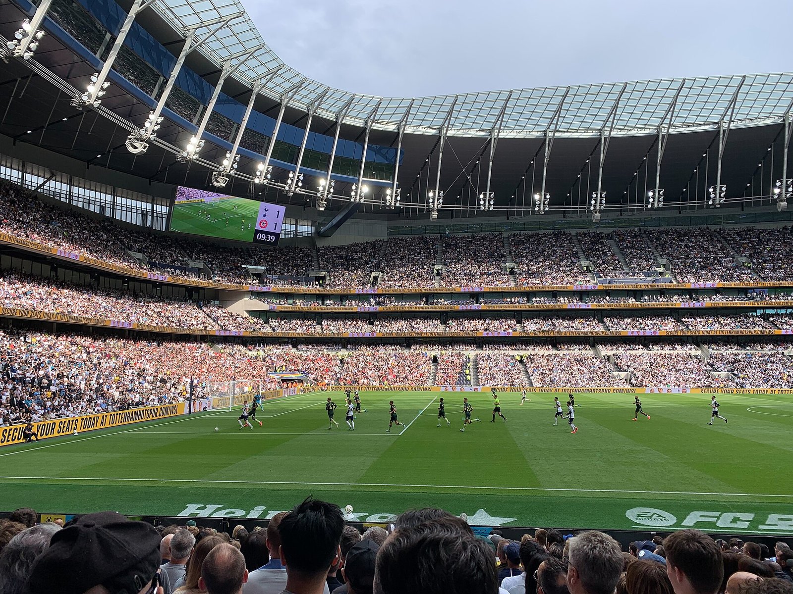 Atmospheric view of an English Premier League football stadium lit up for a match.